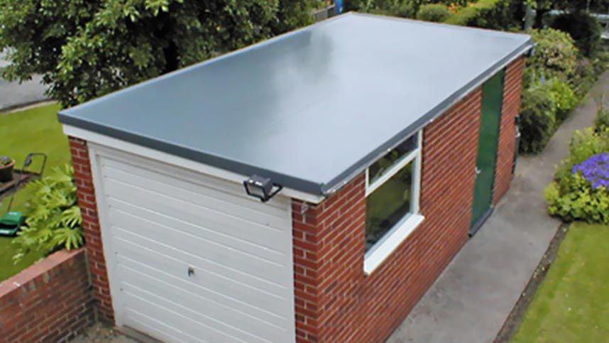 A flat garage roof installed by our team