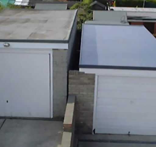 A new flat garage roof installed by our team